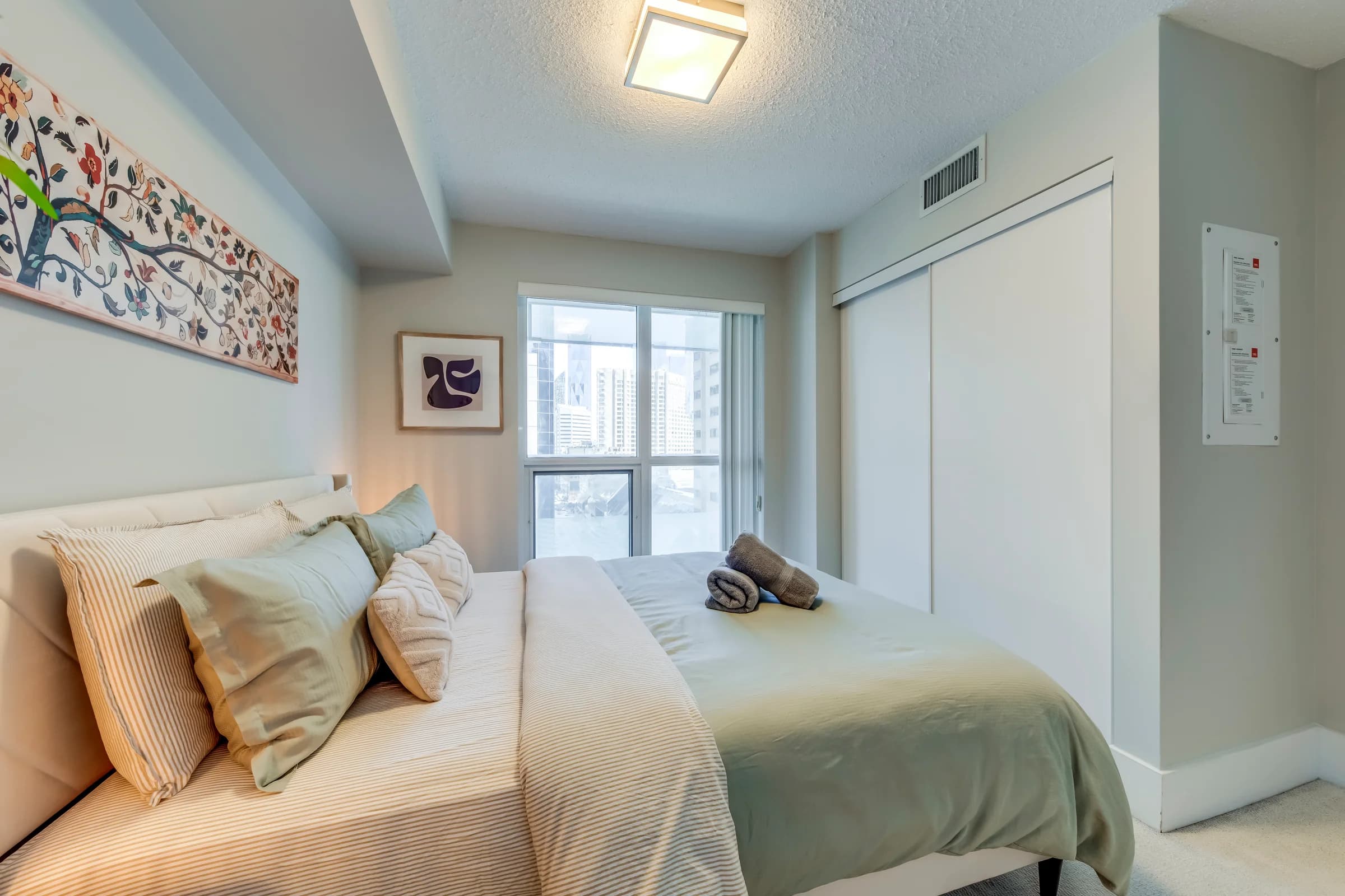 Open living and dining area in a furnished Toronto short-term rental